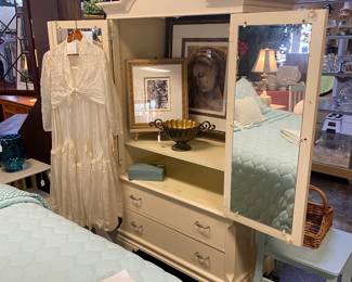White Armoire with Mirrored Inside Doors and Ornate Carved Top