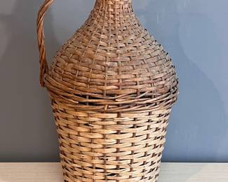 Found at Playing Hookey Antiques, LARGE wicker covered glass jug 
