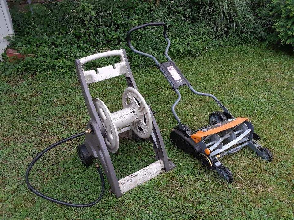 Fiscker manuel lawn mower, hose reel