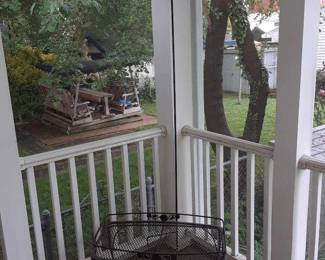 Wrought-iron plant hook and small wrought-iron table