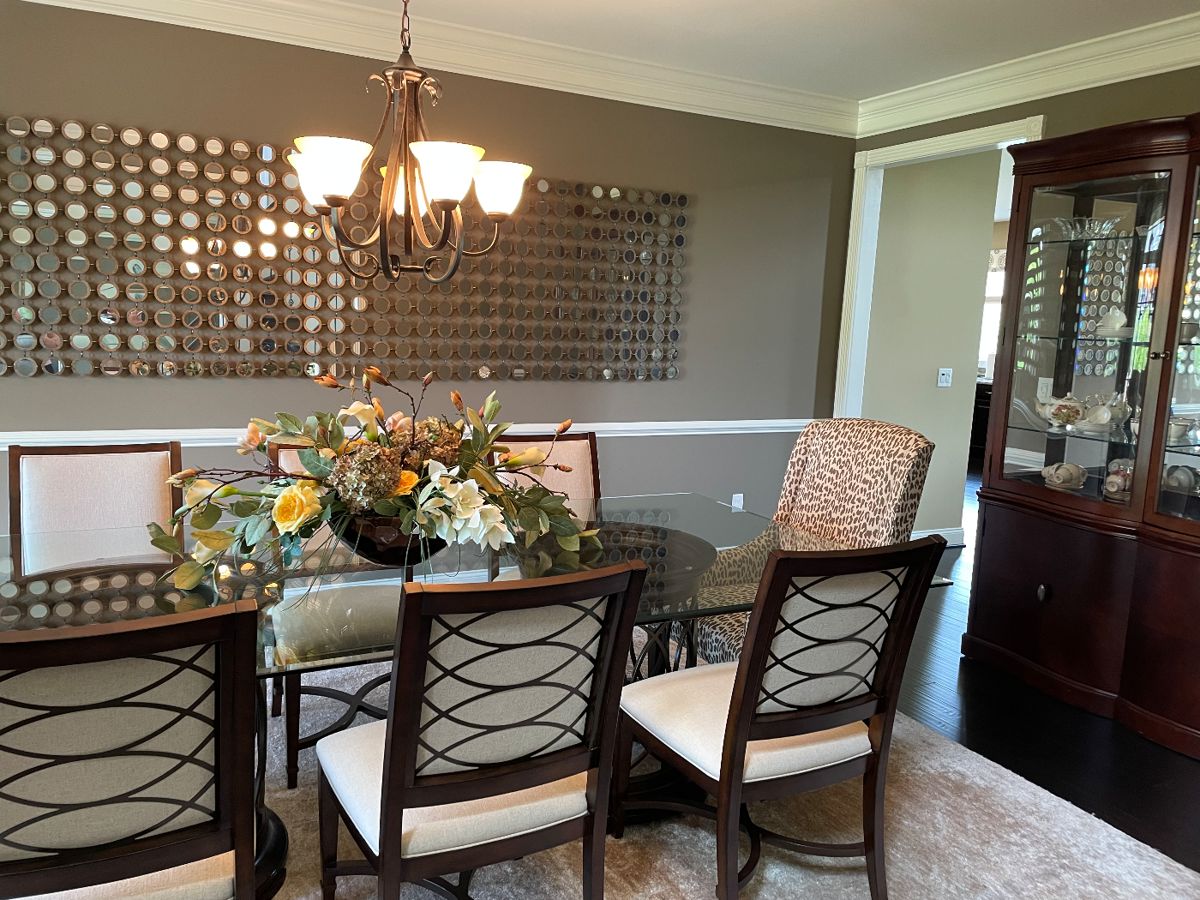 Dining table with round metal pedestals and beveled glass (1'2" glass) top, 6 linen side chairs, 2 upholstered armchairs, china hutch with cabinet by Bernhardt