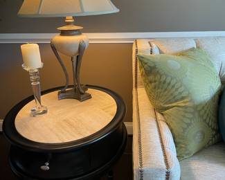 Side table with black wood and ivory fossil stone top; metal and stone lamp (pair available)