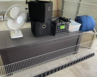 Patio Storage chest, fan, storage cubes, Coleman sleeping bag, wire shelf and edging material