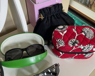 Kate Spade sunglasses, Evening bag, nail dryer fans, and jewelry travel case