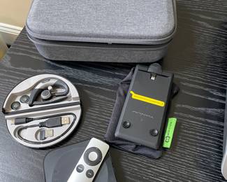 Mavic Drone; earbuds, Apple TV, and charger