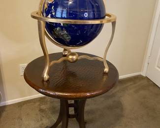 Brass globe with opal.