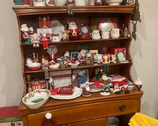 Lots of Christmas decorations, platters, dishware