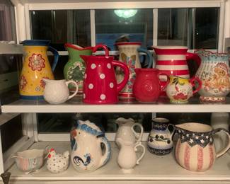 Lots of holiday and decorative pitchers