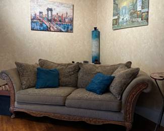 Grey tapestry couch and love seat.
