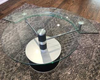 Modern glass coffee table $275. Rug 83 x83 SAFAVIEH $220