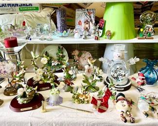A collection of Hummingbird figurines, holiday ornaments, etc.