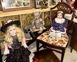Collectible dolls, vintage chair, plush animals, antique photos, etc.