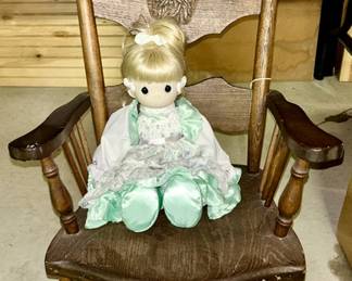 Antique child's rocking chair with carving, Precious Moments doll