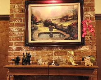 Kinkade painting along with a selection of home decor 
