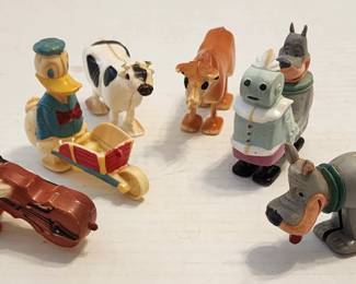 Vintage mid-century plastic walking figures