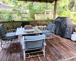 nice patio set with four chairs and fire pit table 