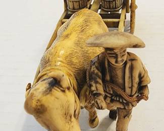 Vintage Japanese celluloid figurine - man with ox and cart