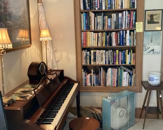 Piano, Hundreds of books, lamps, and art