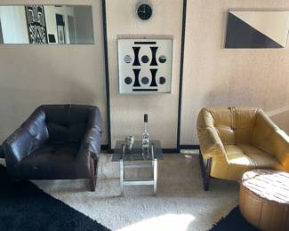 Perceval Lafer rosewood and leather arm chairs.