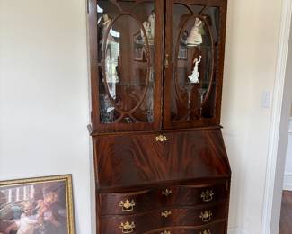 Lighted Mahogany Secretary desk and hutch with original key. 
By Jasper Cabinet. Gorgeous condition.
Just reduced. 