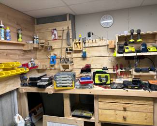 Woodworking shop. Some chargers left. Lots of small items and tools left. 