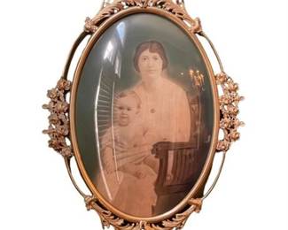 Lot 023   
Antique Ornate Floral Gilt and Bubble Glass Frame and Portrait