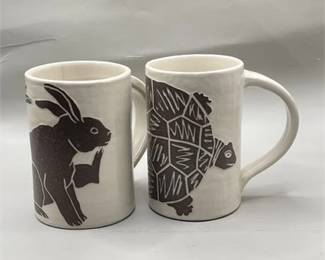 Lot 653  
Karis Swink Barry Hare and Tortoise Mugs
