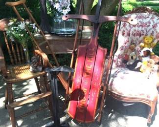 Antique furniture and winter sled....looks like the one we had as children...fun times