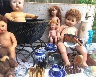 Antique wicker buggy.  Dolls of all ages in need of new families