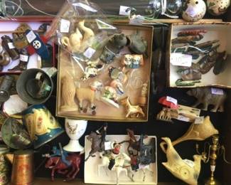 A sampling of barnyard and nativity scene animals, lead soldiers, tin children's dishes 