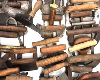 Antique hand wrought iron and wood food choppers of all shapes, sizes