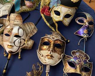 Assorted decorative costume and mardi gras masks from Italy, signed