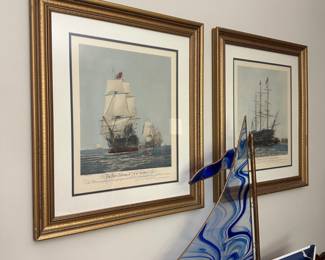 The First, and Last Journey of Victory (pair of framed Sailboat art -before and after battle pictures); hand- blown stained glass artisan made sailboat