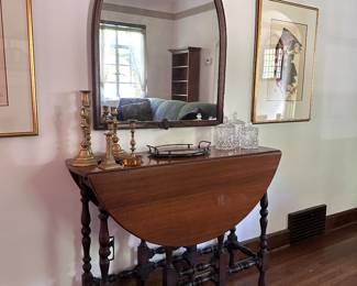 Antique gateleg table, mirror and decor.