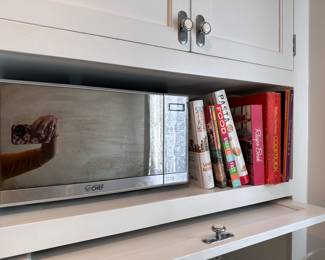 Microwave and cookbooks.
