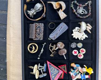 Vintage pins & earrings.