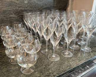 A large assortment of crystal stemware and barware.