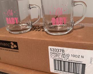 Two full boxes of Luminarc pink Oh Baby mugs for baby shower.