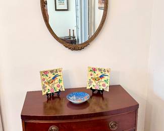 One of two small mahogany chests.