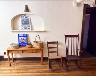 Various antique and vintage furniture pieces.