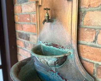 Copper wall fountain.