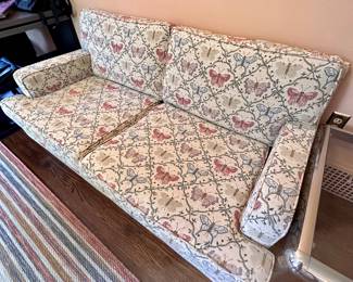 Two beautiful and immaculate butterfly sofas.