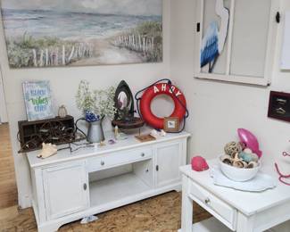 White low-boy tv stand and a white end table