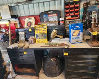 Another work bench loaded with tools: RYOBI drill; press, KREG crosscut station , nail gun, HUSKY socket set