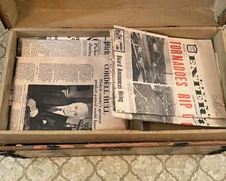 Trunk open 
Old newspapers 