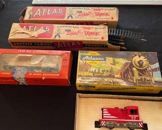 Train tracks in boxes 
Lionel car in box 