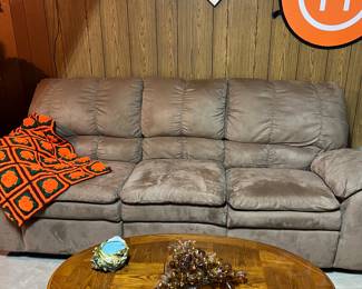 Leather recliner on each end sofa 