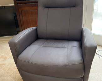 $150.  Very nice lite weight portable recliner rocker.   Like new faux leather upholstery seat measures 24” wide 17” high x 20” deep.   The back is 39” tall. 