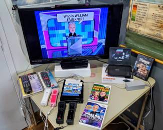 Wii with 4 working controllers. Portable DVD player. Sanyo 32 inch TV.