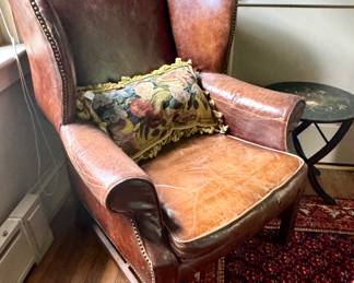 Dreamy old leather wingback, embroidered pillow and painted folding table